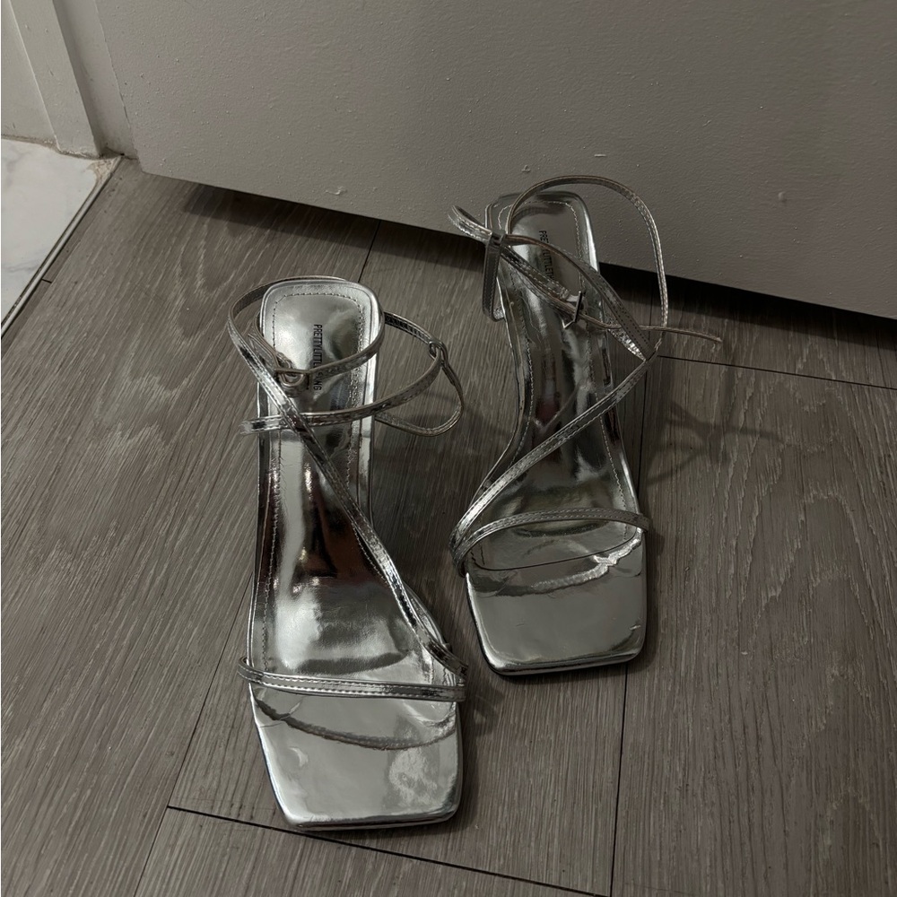 Silver strap heels. Size 7